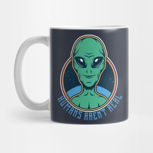 Alien saying humans aren't real Mug